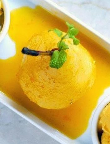 Classy Poached Pear In Spicy Mango Nectar With Mango Ice Cream